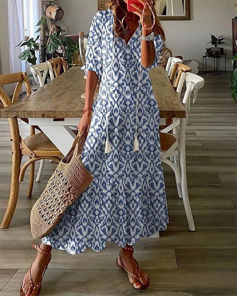 I'm unable to access external links, including the one you provided. However, if you have specific questions or need information about dresses or any other topic, feel free to ask!