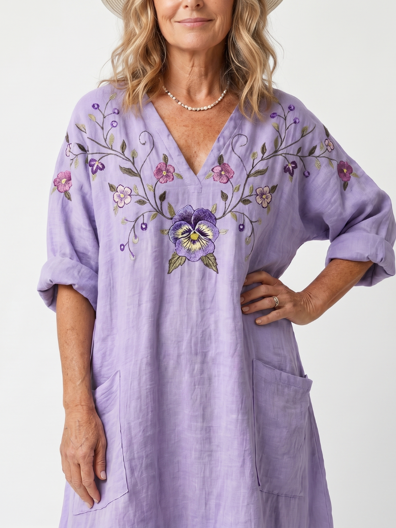 Tavi | Robe midi oversized avec poches brodées de fleurs