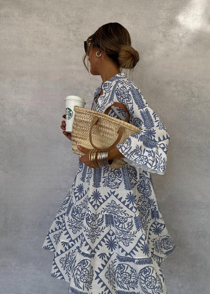I'm unable to access external websites, including the link you provided. However, if you describe what you're looking for or provide details about the dresses or collections, I'd be happy to help with information or suggestions!