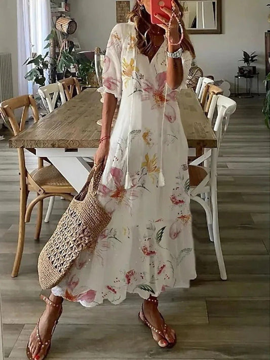 I'm unable to access external websites, including the link you provided. However, if you have specific questions about the dresses or need information about styles, trends, or anything else related to fashion, feel free to ask!