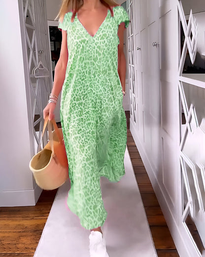 Véronique | Robe longue à décolleté en V en imprimé léopard avec manches courtes