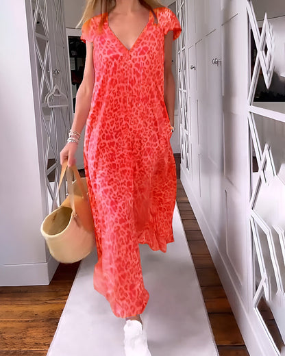 Véronique | Robe longue à décolleté en V en imprimé léopard avec manches courtes